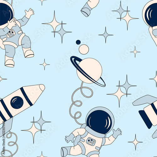 Cute astronauts in space with rocket and planet. Cartoon vector illustration. Seamless pattern for fabrics, wrapping paper, wallpapers.