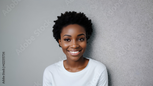 Portrait of smiling woman with curly hair on empty background with mockup. Generative Al. © Dawid