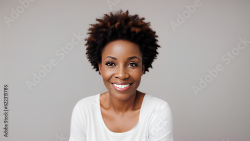 Portrait of black woman with curly hair smiling at camera on natural background with mockup. Generative AI. © Dawid