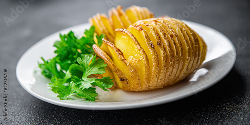 Fotografie baked potato slice accordion vegetable meal food snack on the table copy space f