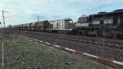 WDG4 locomotive hauls a tanker train at Kedgaon near Pune India. photo