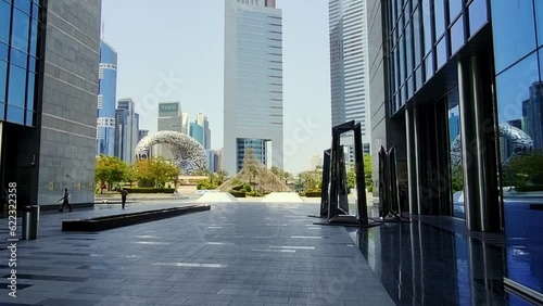Dubai, UAE - 06.15.2023 - Footage of Dubai International Financial Center, Gate building. Landmark