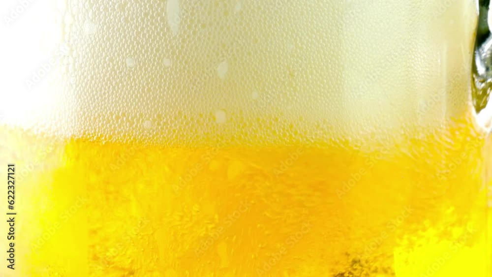 Refreshing Pour: Close-Up of Pouring and Serving Cold Beer into a Glass, Showcased in Crisp 4K Resolution Refreshing Pour: Close-Up of Pouring and Serving Cold Beer into a Glass, Showcased in Crisp 4K Resolution