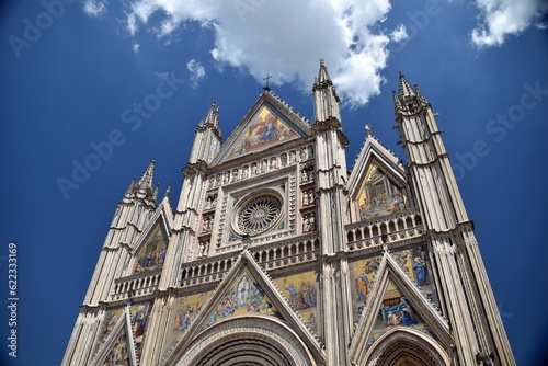 Orvieto in Italy and its wonderful white cathedral with some details of the front