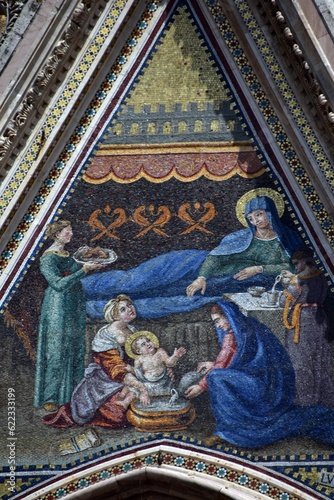 Orvieto in Italy and its wonderful white cathedral with some details of the front