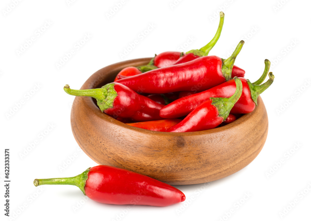 Red hot chili peppers in wooden bowl on a white background