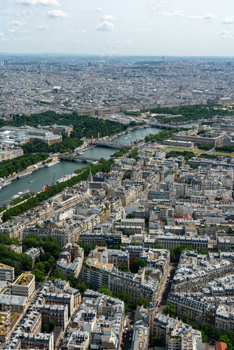 City view from the Eiffel Tower observation deck in the summer time