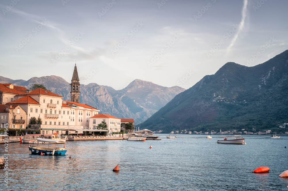 Panoramic view of the picturesque town of Perast in the Bay of Kotor with the promenade, beautiful historic buildings and boats, Montenegro..