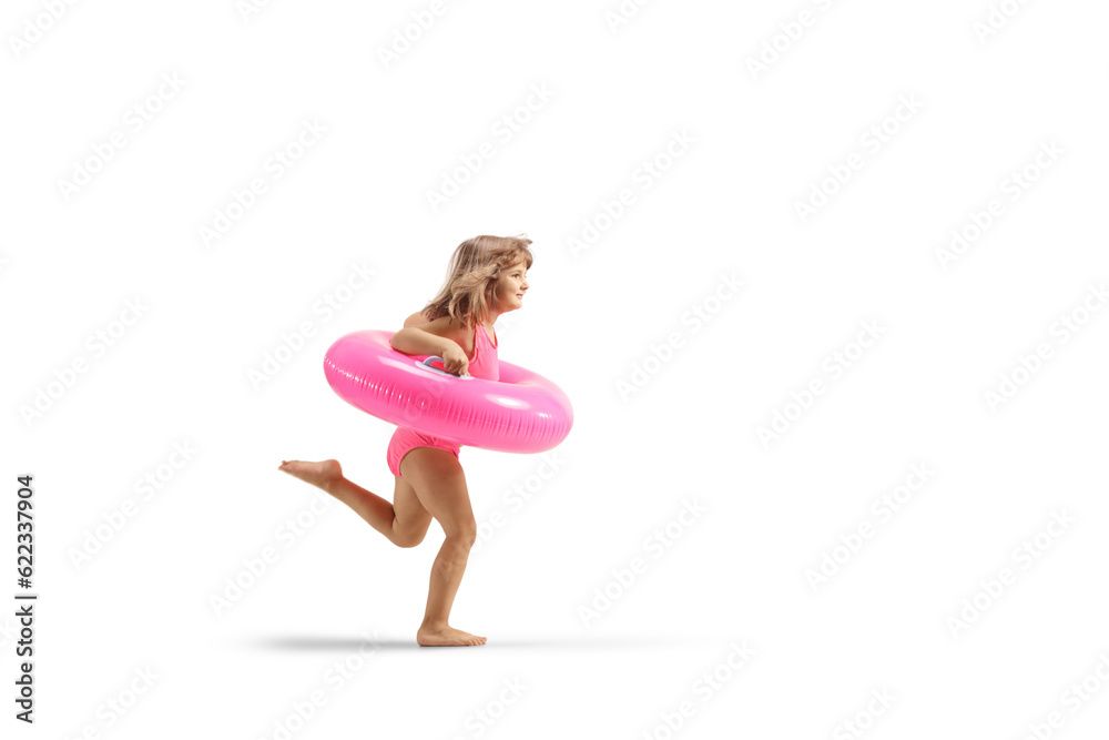 Little girl running with a pink rubber swimming ring Little girl running with a pink rubber swimming ring