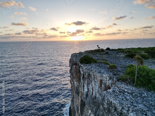 Golden sunrise from the Bluff, Cayman Brac a paradise within the Cayman Islands sister island to Grand Cayman in the Caribbean surrounded by sea a British oversea territory for tranquility relaxation