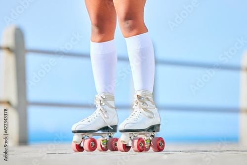 Legs, roller skates and shoes on street for exercise, workout or training outdoor. Skating, feet of person and sports on road to travel, journey and moving for freedom, hobby and fitness practice.
