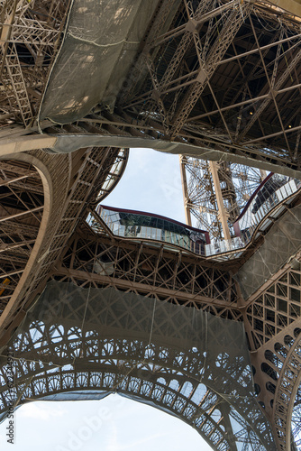 View of the lower part of the Eiffel Tower in Paris, France