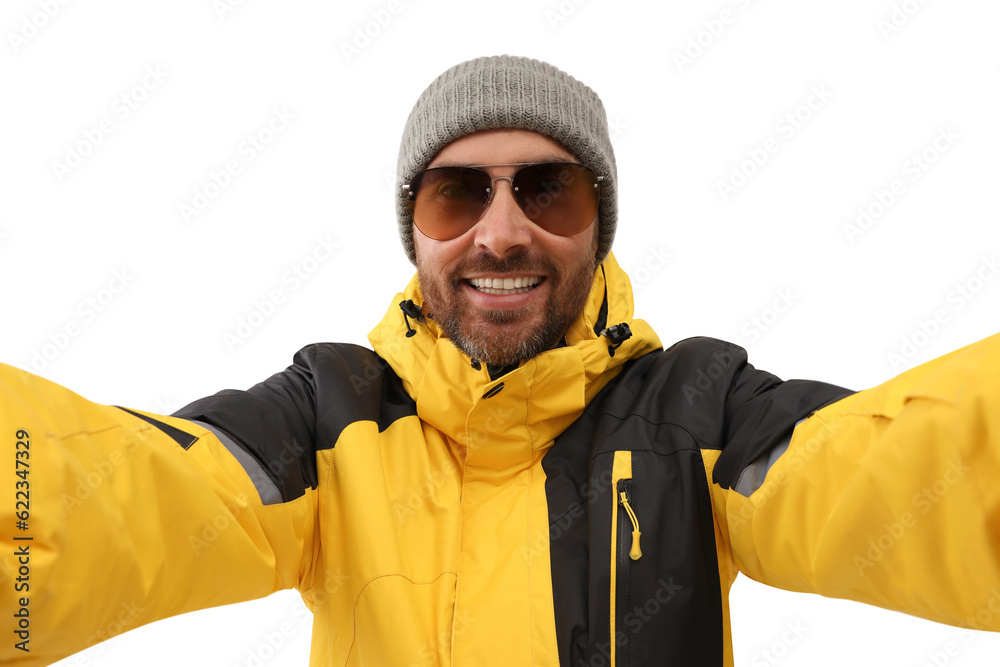 Smiling man in hat and sunglasses taking selfie on white background Smiling man in hat and sunglasses taking selfie on white background