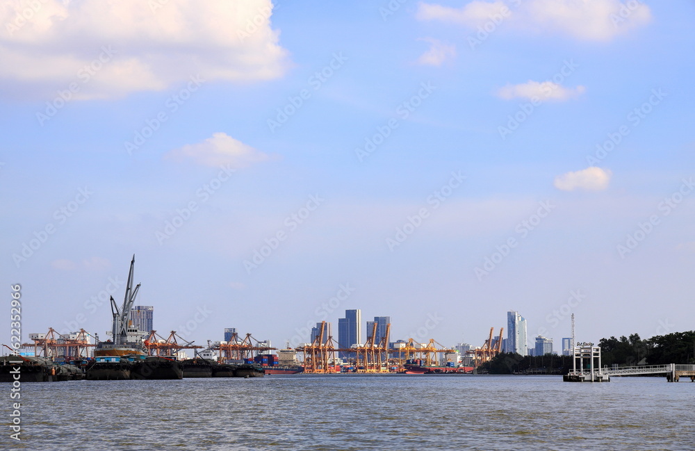 The Cargo ship or Freight ship fleet on service near Bangkok shipping container terminal, One of the Asian modernize harbor and global trade.
