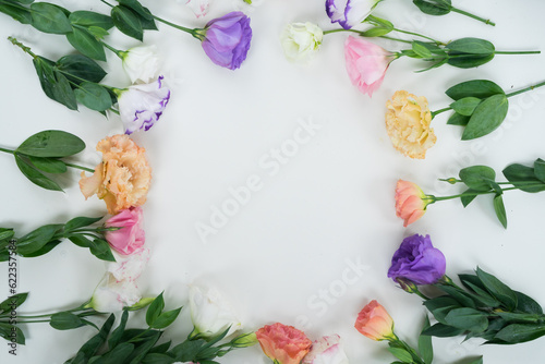 Pink, white and violet eustoma flowers frame