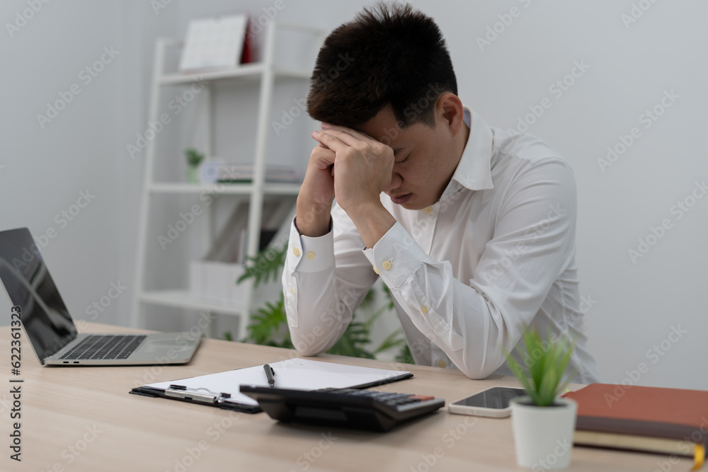 Asian man disappoint, sad after receive bad news. Stressed boy confused with unhappy problem, arguing with girlfriend, cry and worry about unexpected work, down economy. Asian man disappoint, sad after receive bad news. Stressed boy confused with unhappy problem, arguing with girlfriend, cry and worry about unexpected work, down economy.