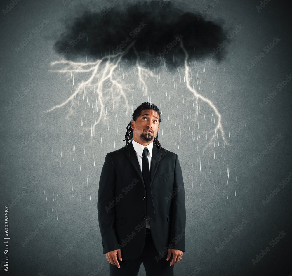 Desperate businessman with cloud over his head Desperate businessman with cloud over his head