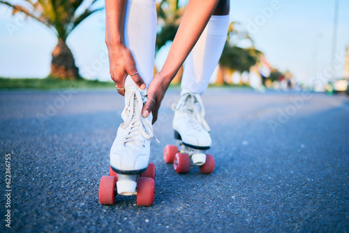 Leg injury, roller skates and hands on street for exercise accident, workout or training mockup. Skating, shoes of person and pain on road, arthritis or medical emergency, fibromyalgia and hurt ankle