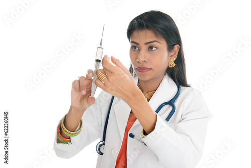 Photography Indian female doctor with syringe, isolated on white background.