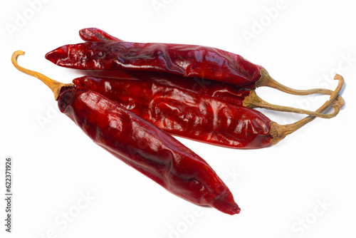 Bright Red dried red chillies are display on white background