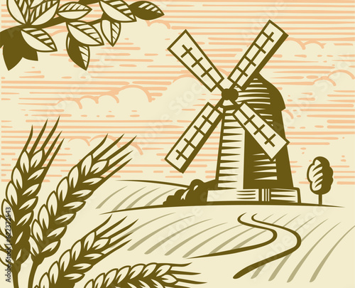 Old mill and wheat. Rural countryside 