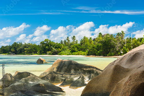 Fototapeta Naklejka Na Ścianę i Meble -  Beautifully shaped granite boulders and a perfect white sand at the famous Anse Source d'Argent beach, La Digue island, Seychelles