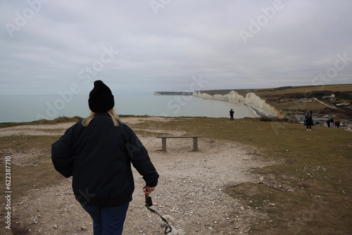 A Winter walk in East Sussex to see the Seven Sisters, Cuckmere Haven and the Long Man of Wilmington. A calming walking weekend on Englands chalk cliff coastline. photo