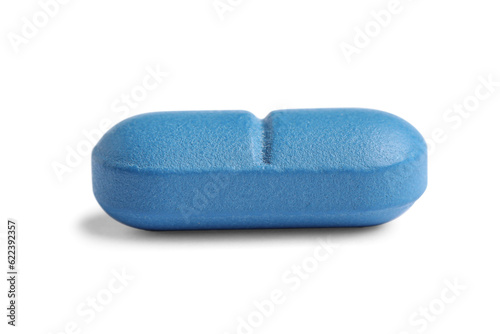 One blue pill on white background. Medicinal treatment