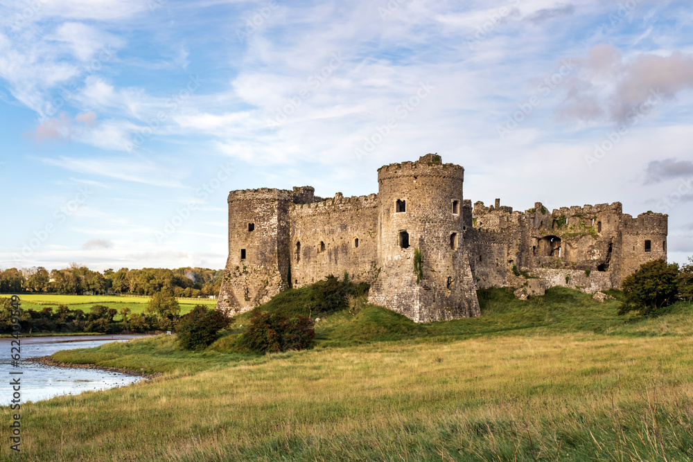 The enchanting ruins of Carew Castle situated by the banks of the River Carew in Pembrokeshire, Wales