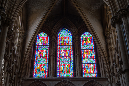 decorated stain glass windows corridor archway	