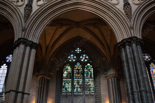 decorated stain glass windows corridor archway 