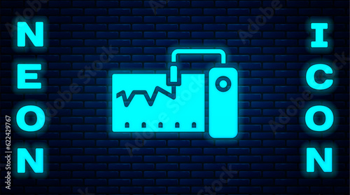 Glowing neon Electrical measuring instrument icon isolated on brick wall background. Analog devices. Measuring device laboratory research. Vector