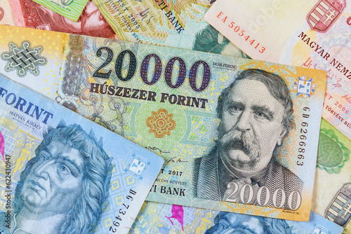 Fotografie Close-up of HUF cash Hungarian forints, accepted legal tender in Hungary different sizes