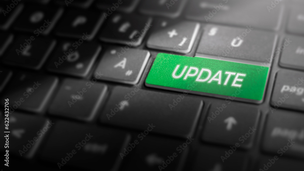 Update key on laptop computer keyboard, green button on the dark grey keybord of a modern laptop notebook, technology concept for software updates and system upgrades, close-up, close-up Update key on laptop computer keyboard, green button on the dark grey keybord of a modern laptop notebook, technology concept for software updates and system upgrades, close-up, close-up