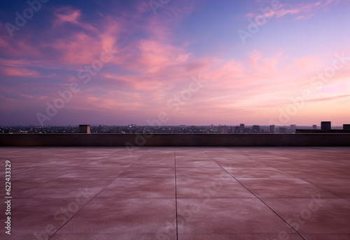 A view of the purple sky at dusk over the rooftop of a building. 