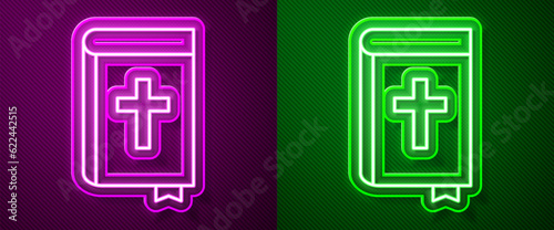 Glowing neon line Holy bible book icon isolated on purple and green background. Vector