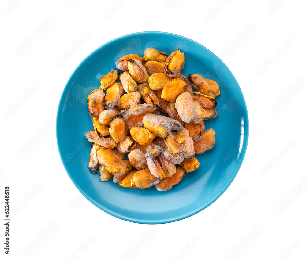 Frozen peeled mussels on a blue ceramic plate isolated on a white background, top view. Frozen peeled mussels on a blue ceramic plate isolated on a white background, top view.