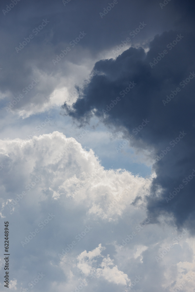 white storm clouds in sky background of nature. weather and climatic conditions, ecology. view of clouds from airplane window. Flight and freedom are religion. The top of sky and atmosphere, solar