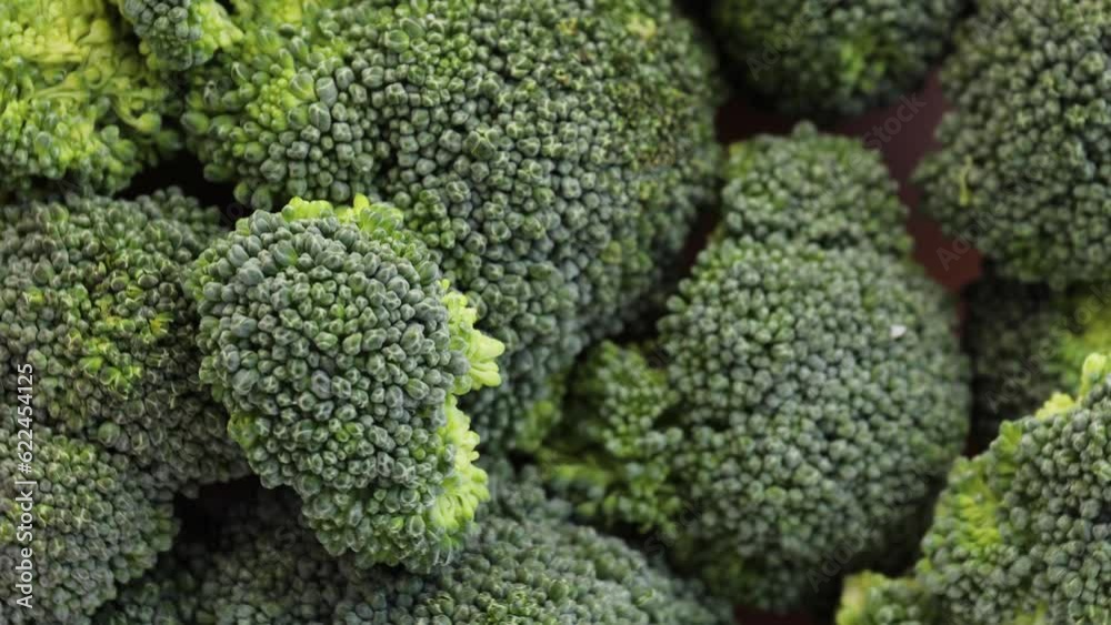 green fresh broccoli vegetables, rotation in circle. broccoli inflorescence Turning. selective focus green fresh broccoli vegetables, rotation in circle. broccoli inflorescence Turning. selective focus
