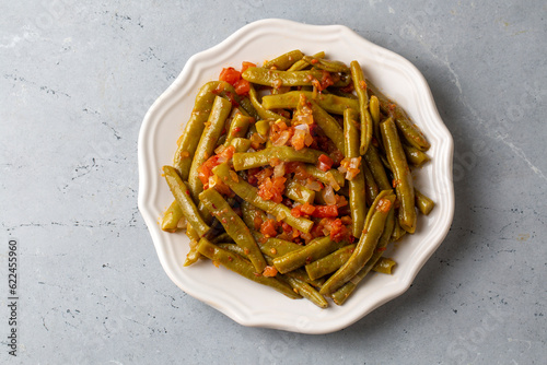 Obraz na płótnie Traditional delicious Turkish food; Green beans with olive oil; Turkish name; Zeytinyagli taze fasulye w salonie