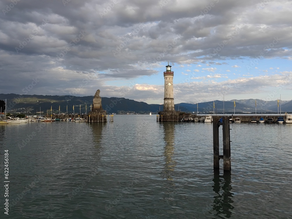 Lindau, Germany. Old lighthouse with clock in the bay