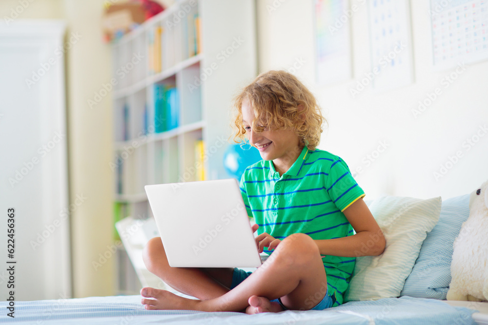 Online remote learning. School kids with computer. Online remote learning. School kids with computer.