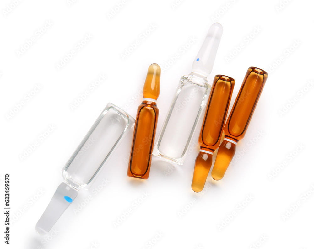 Glass medical ampules on white background Glass medical ampules on white background