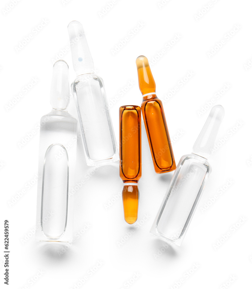 Glass medical ampules on white background Glass medical ampules on white background