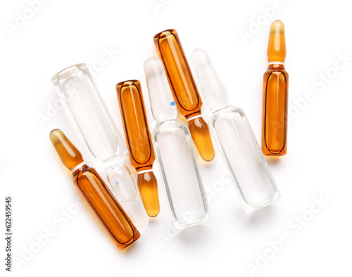 Glass medical ampules on white background
