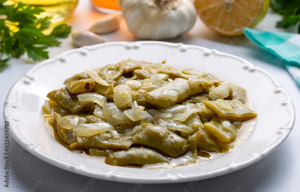 Traditional delicious Turkish food; bean pickle roast. Plate of pickle roasting (tursu kavurma) in the Black Sea region of Turkey. Turkish name; tursu kavurma or fasulye tursusu