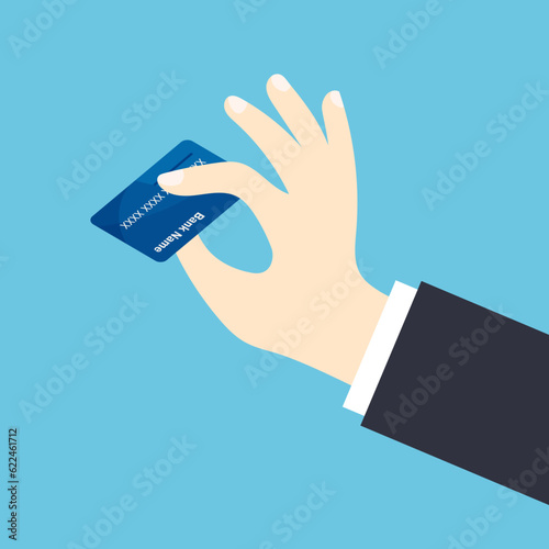 Human hand holding credit card. The businessman pays by card. Vector illustration in trendy flat style isolated on white background.