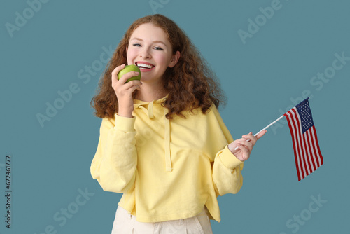 Young woman with USA flag e...