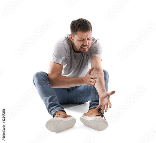 Male drug addict sitting on...