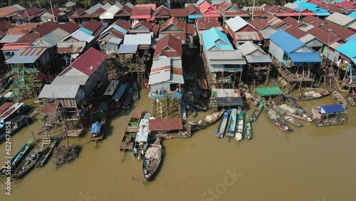Floating village on a river, Kampong Phluk, Cambodia, Boats, fisherman, 4k Drone footage